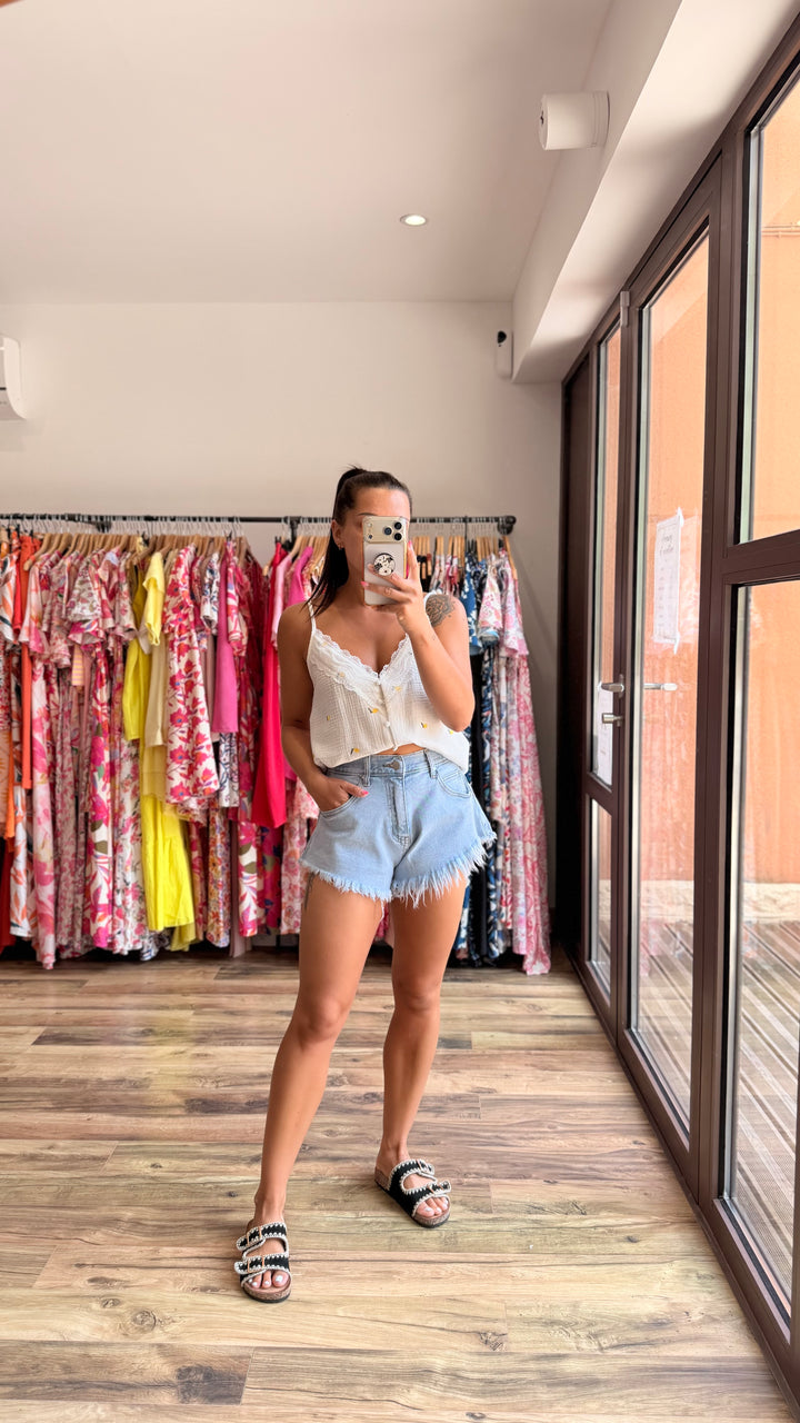 Short en jean franges