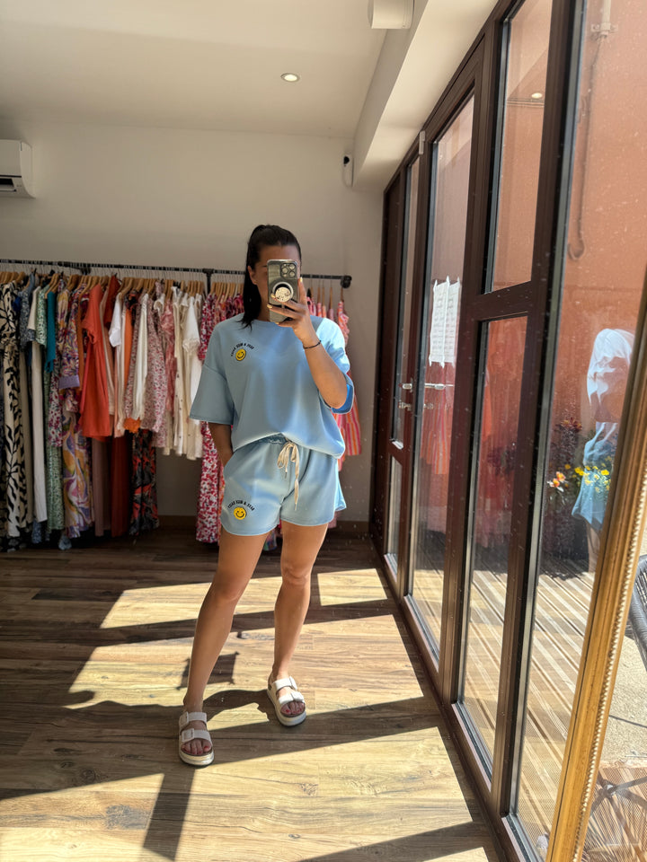 Ensemble smiley bleu