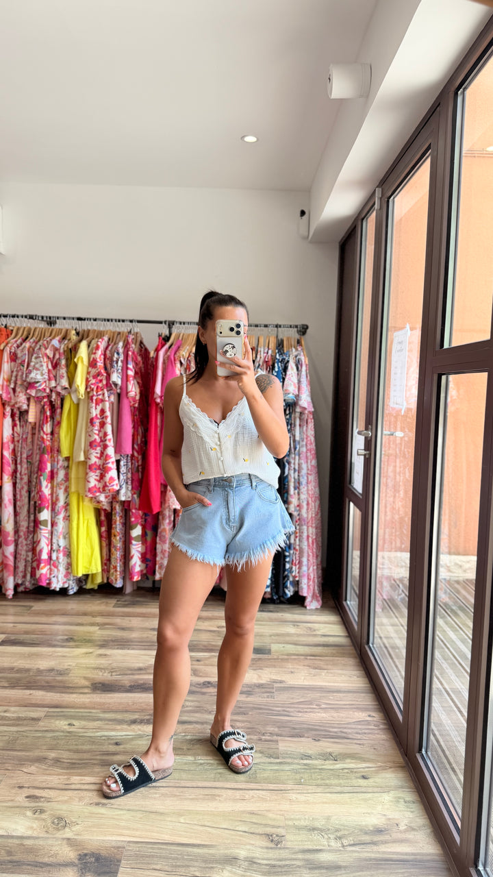 Short en jean franges