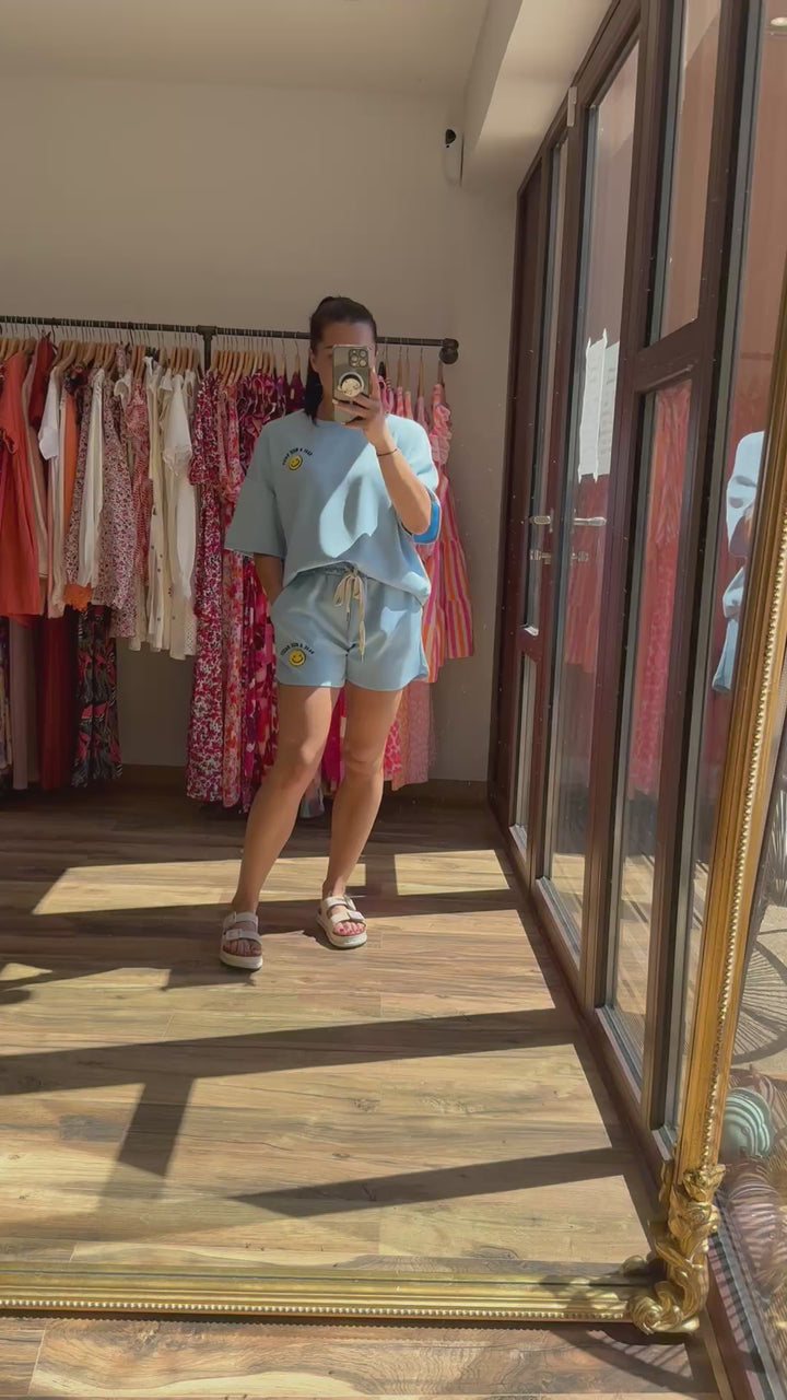 Ensemble smiley bleu